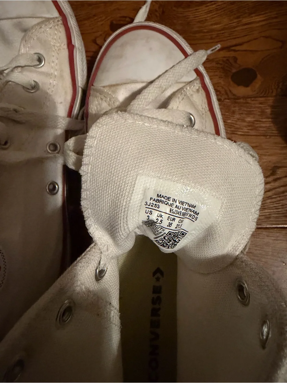 Converse White High-Top Sneakers with Red Stripe